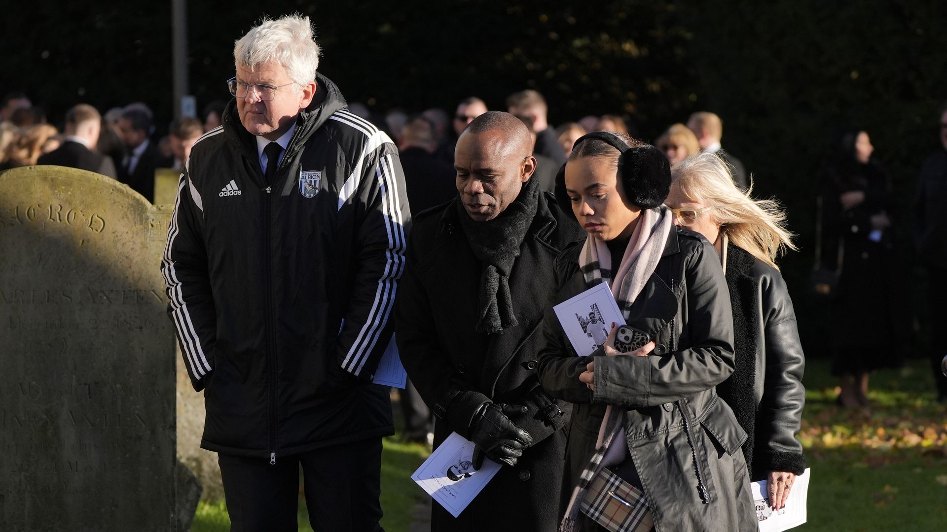 Adrian Chiles (left) after the funeral service