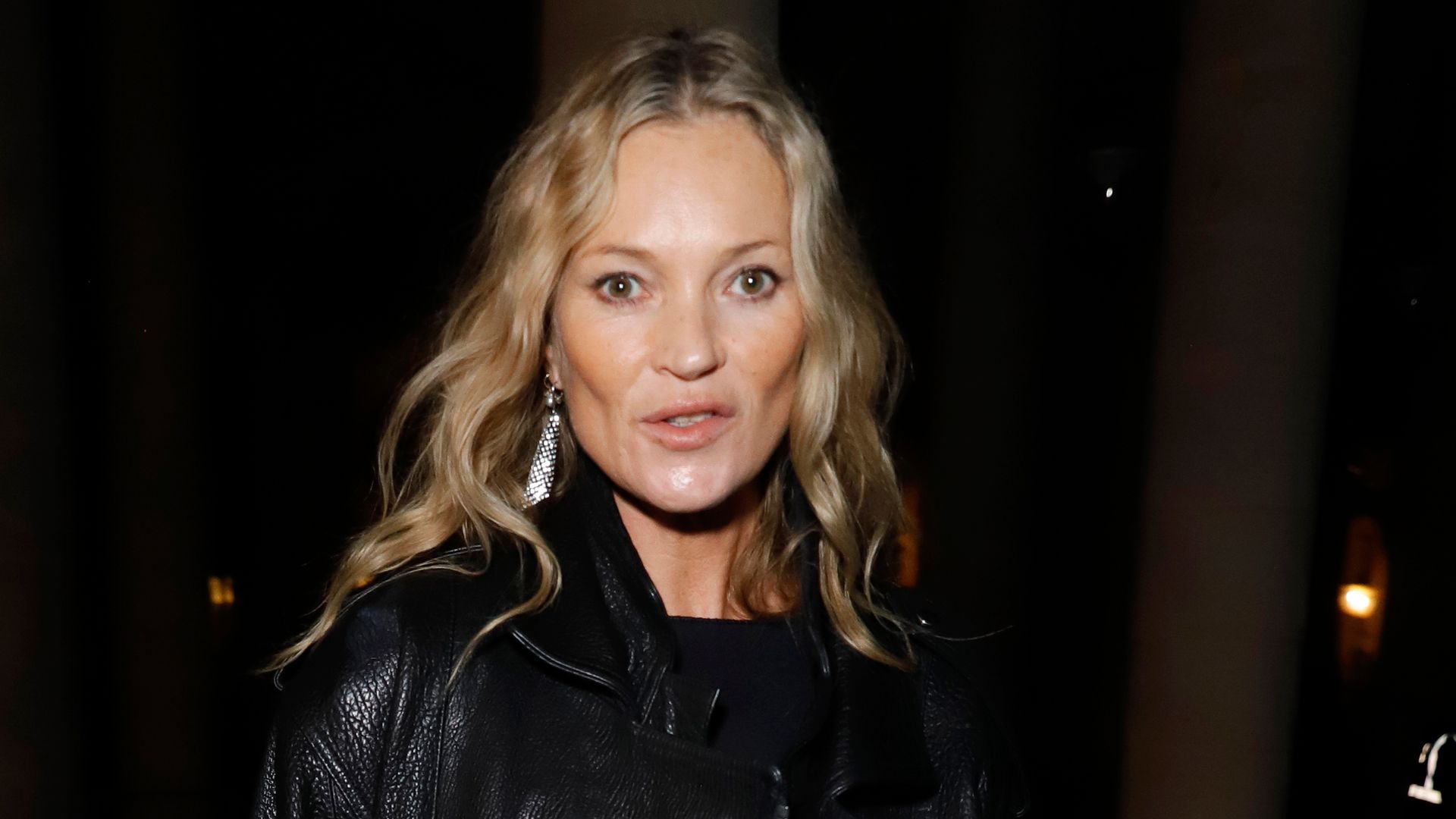 Kate Moss just styled silk pyjama shorts with fishnet tights and we are obsessed