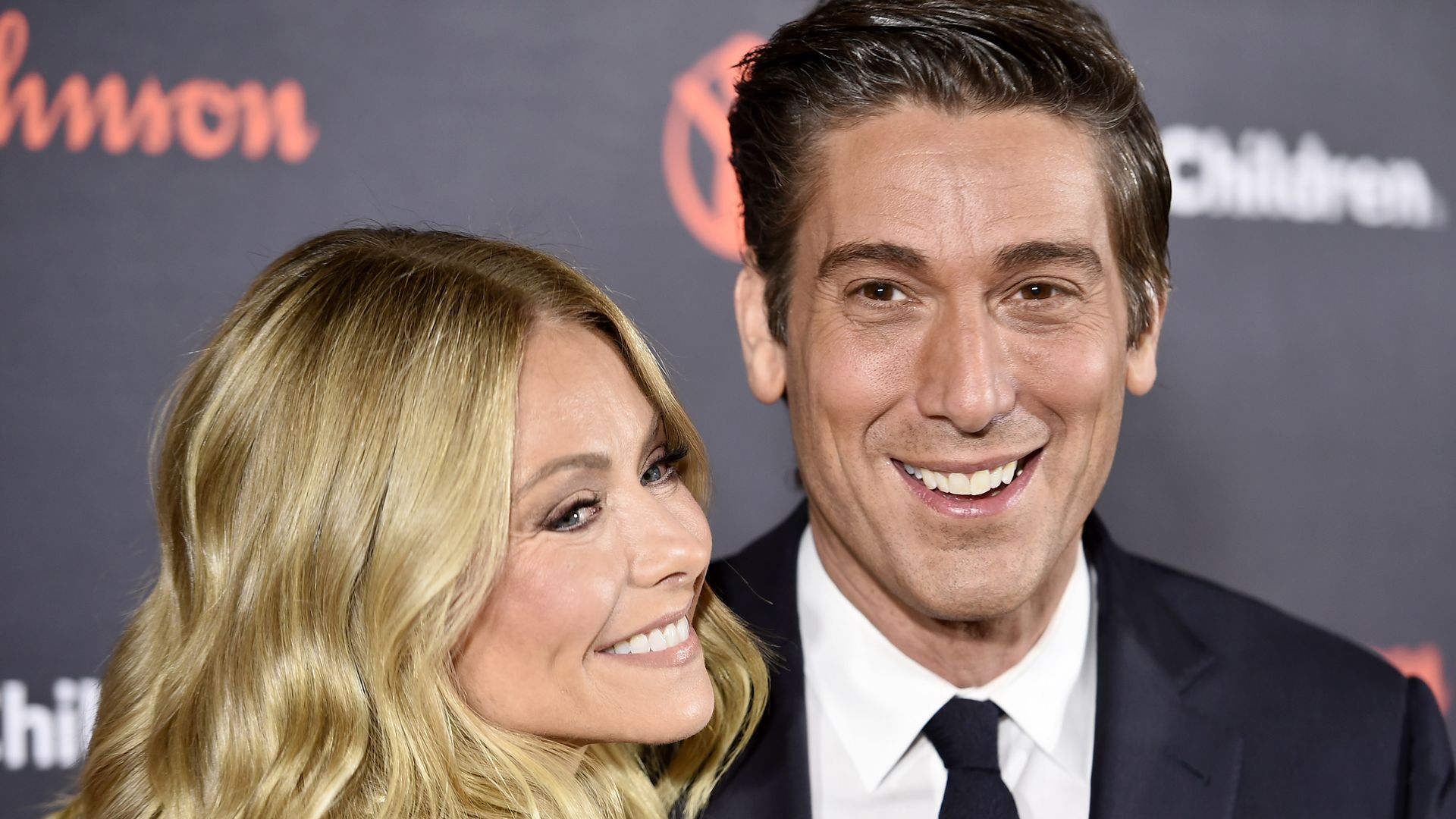 Anchorman/journalist David Muir and actress/TV Host Kelly Ripa attends the 6th Annual Save the Children Illumination Gala at the American Museum of Natural History in New York City on November 14, 2018.