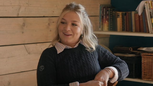 woman sitting in office