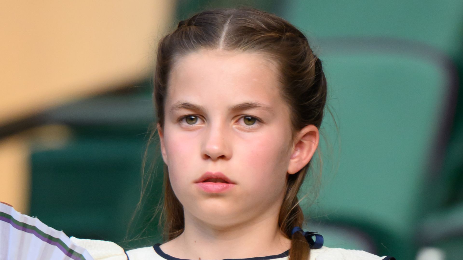 Princess Charlotte in white dress holding fan