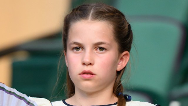 Princess Charlotte in white dress holding fan