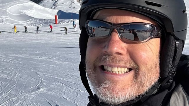 man taking selfie on ski slope