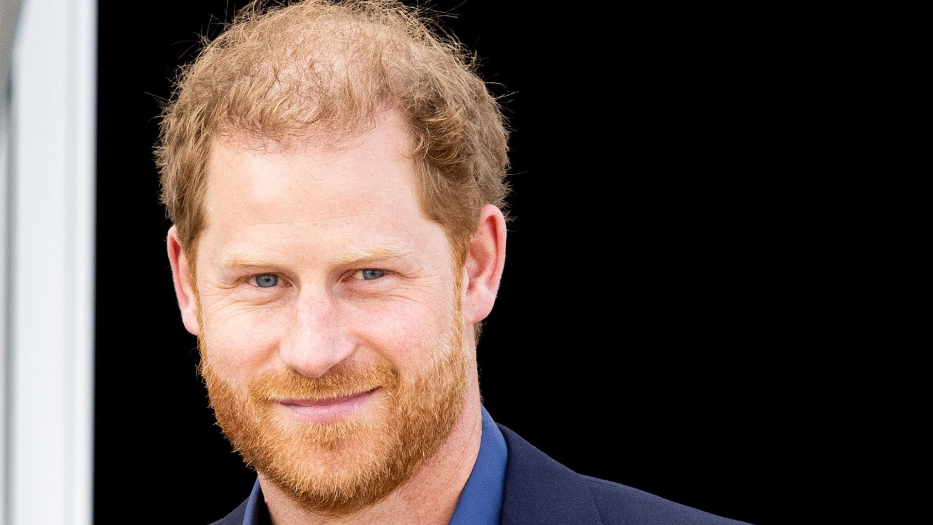 Prince Harry in blue suit