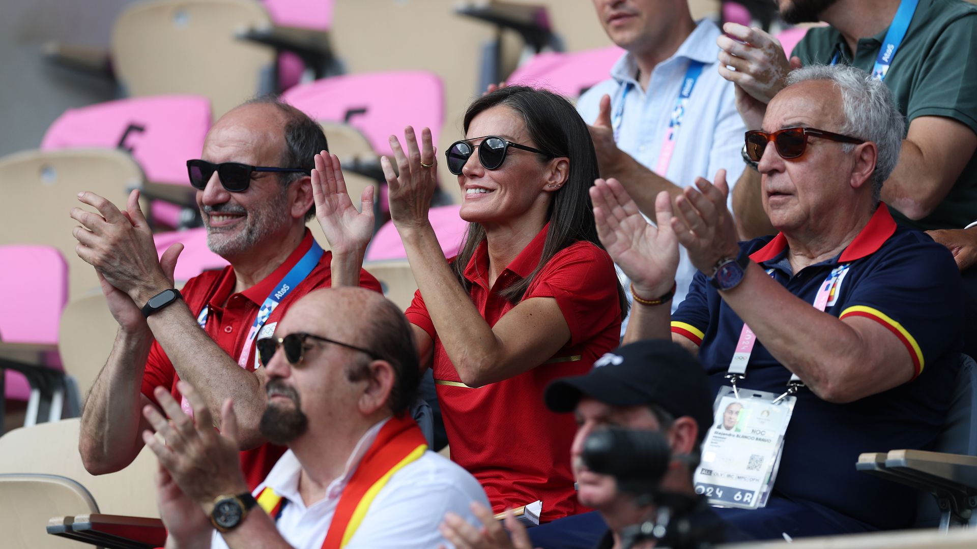 Queen Letizia applauding at a tennis match