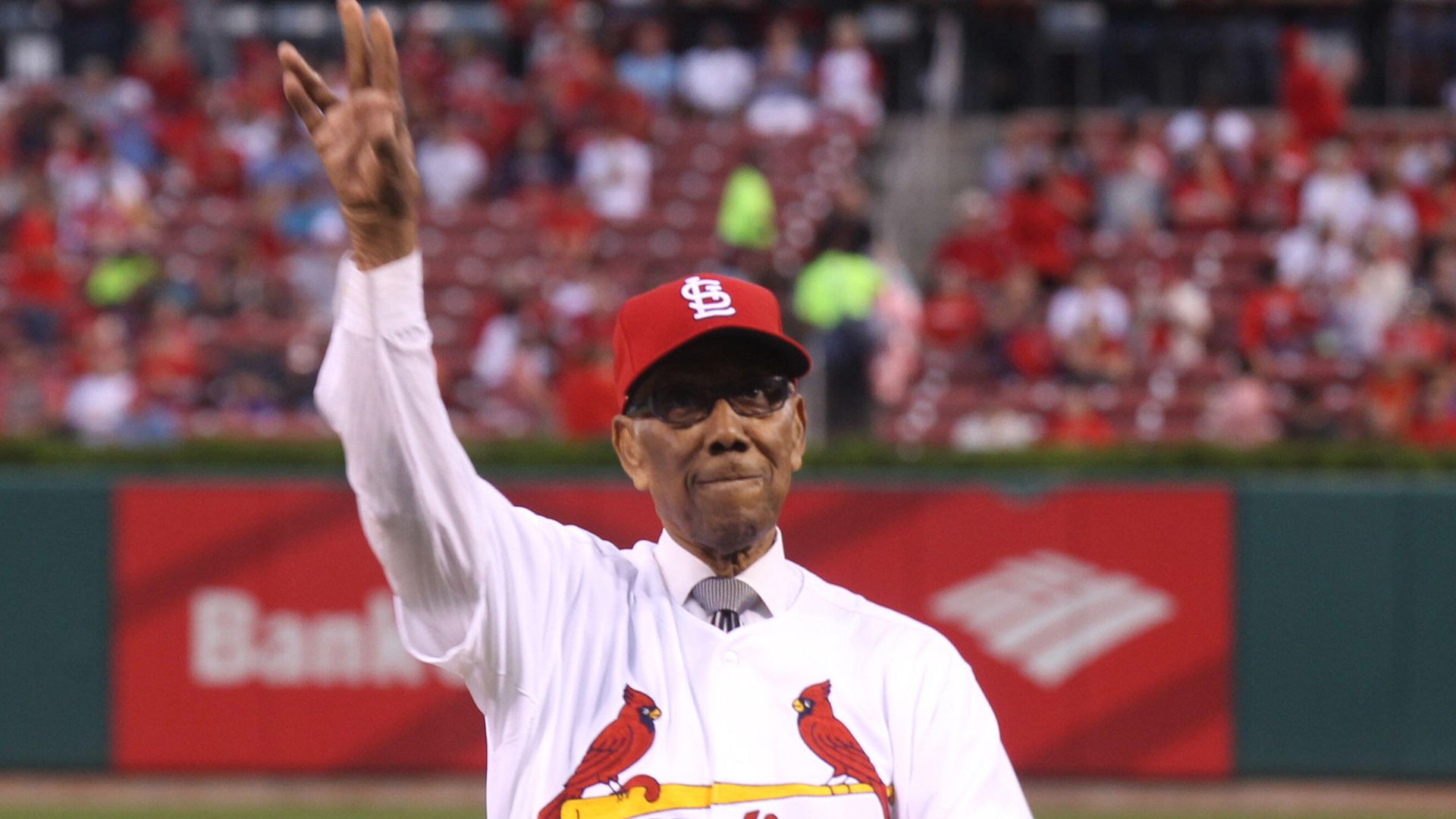 Bill Greason throws a ceremonial first pitch before the Cincinnati Reds-St. Louis Cardinals in 2014.
