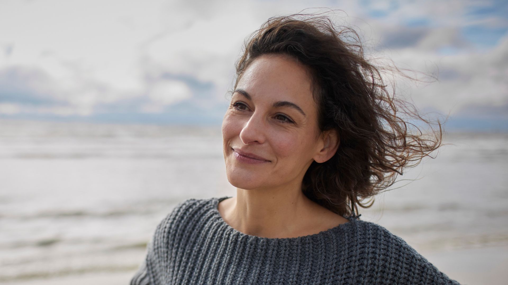 woman smiling on beach