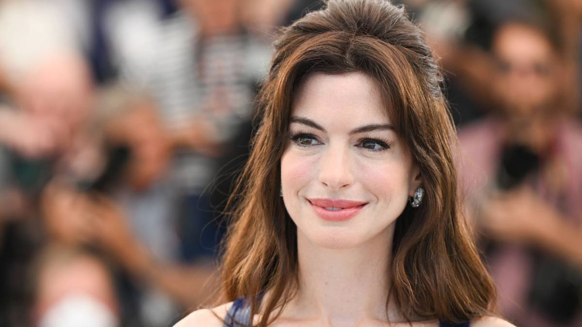 Anne Hathaway Wore Big Bump-It Hair on the Cannes Red Carpet — See Photo