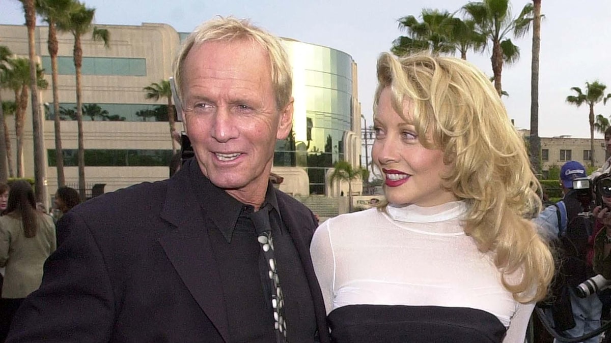Crocodile Dundee stars Linda Kozlowski and Paul Hogan look worlds away from movie roles during reunion
