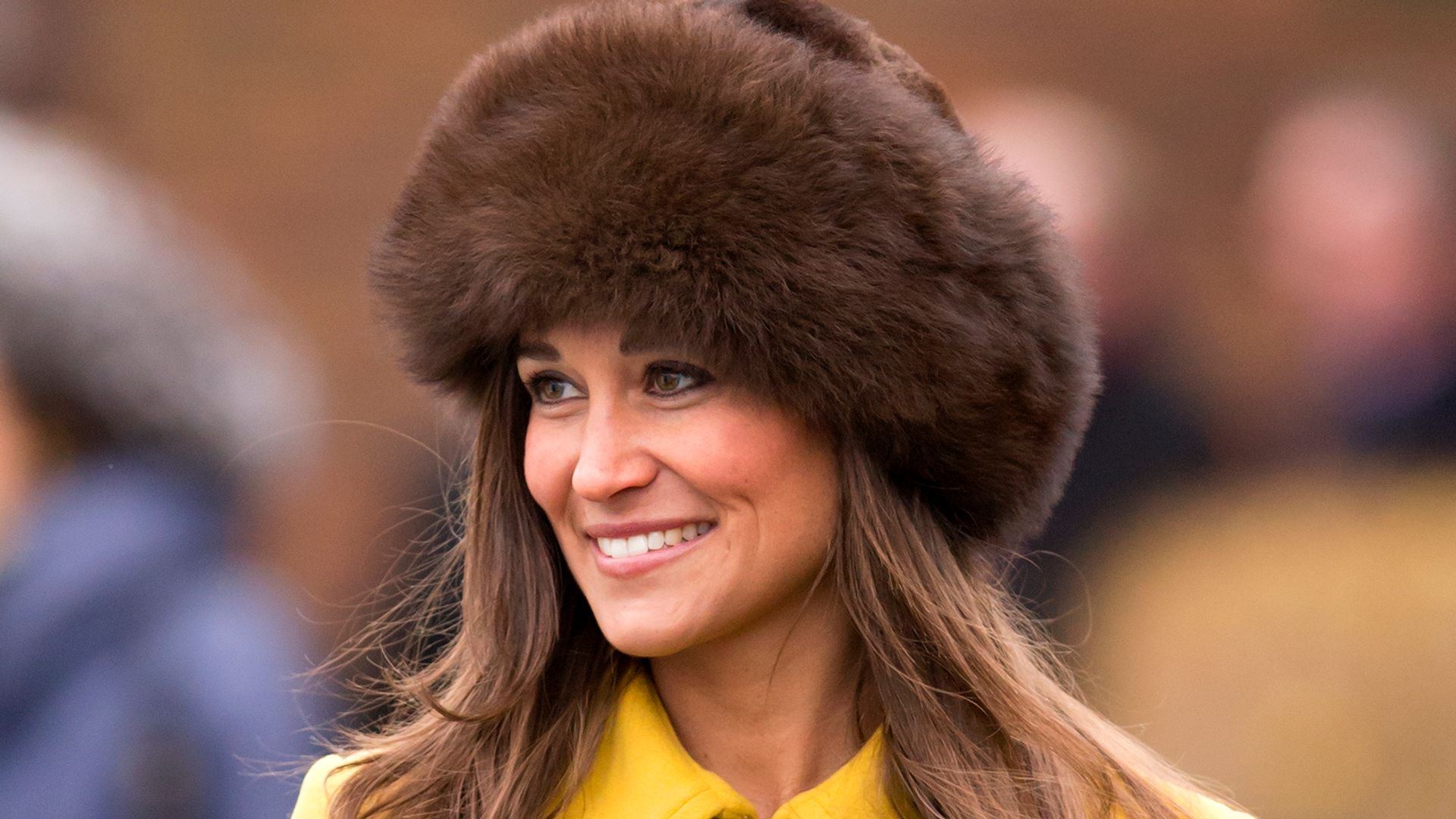 Pippa Middleton attends Day 3 of The Cheltenham Festival at Cheltenham Racecourse on March 14, 2013 in London, England. 