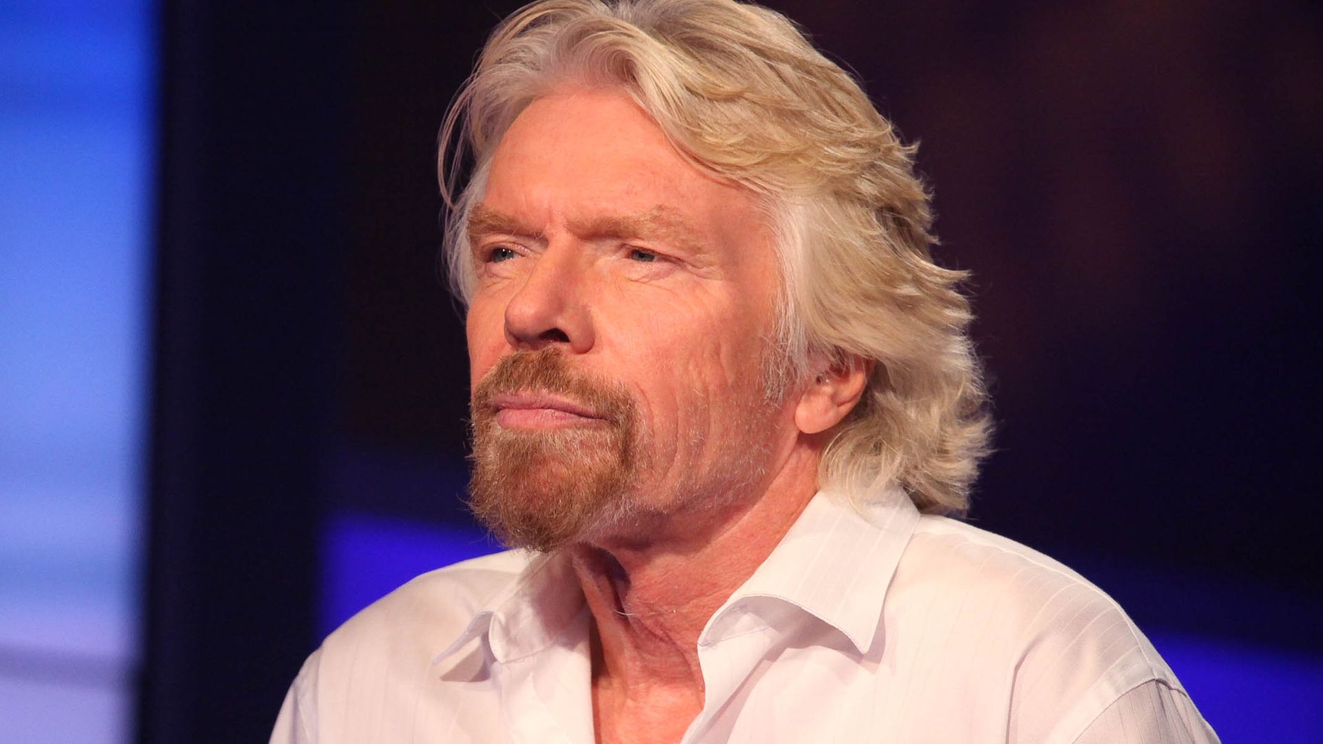 Sir Richard Branson in a white shirt