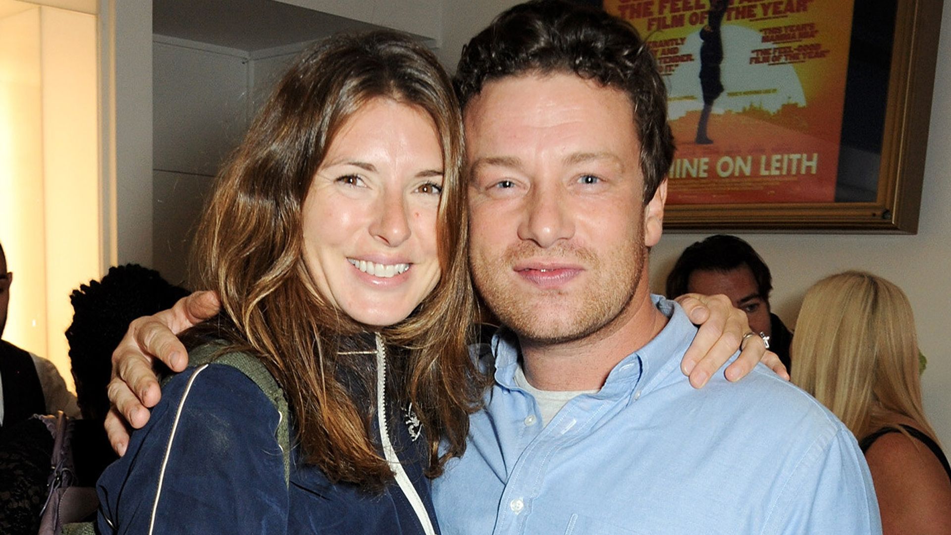 Jamie Oliver looks more loved-up than ever as he renews his
