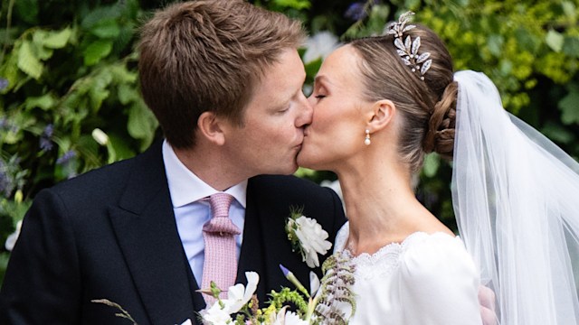 Hugh Grosvenor kissing his new wife Olivia Henson