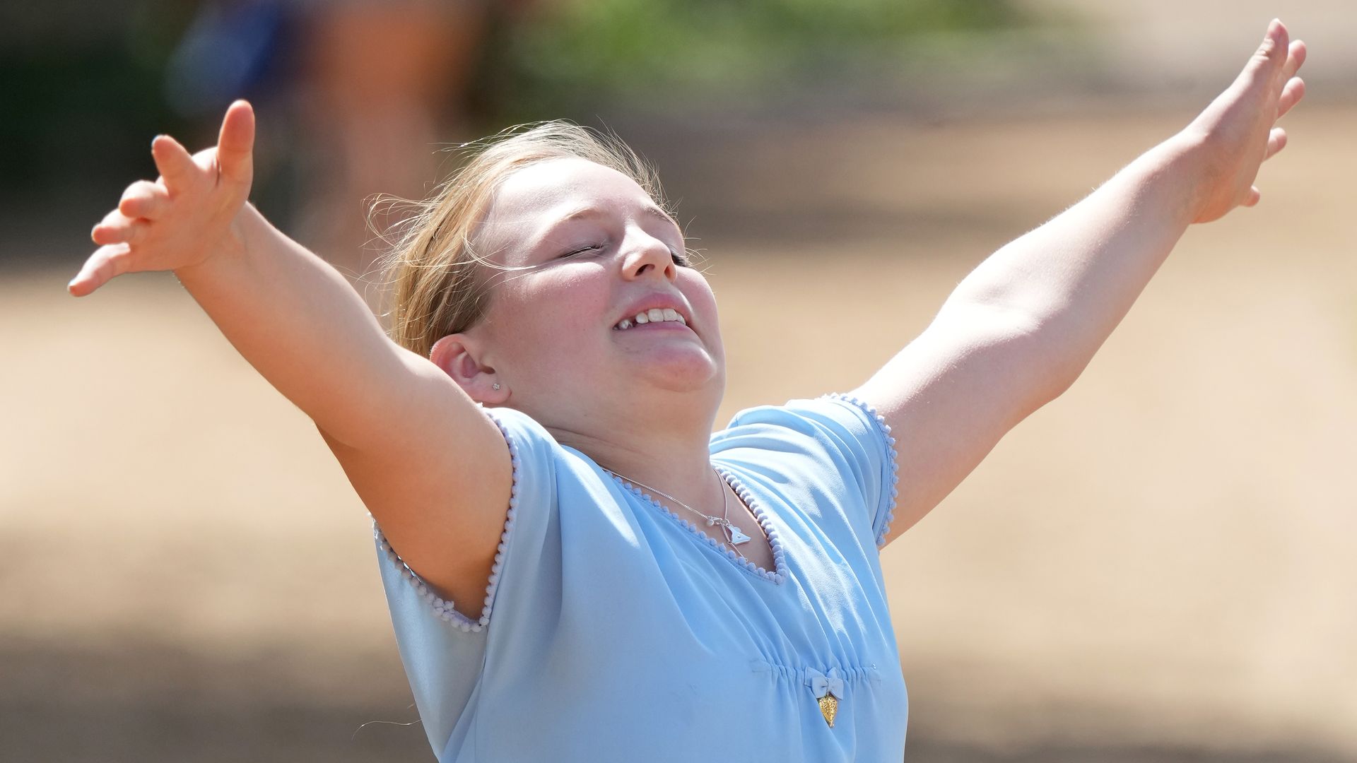 Exclusive: Zara Tindall's daughter Mia 'jumps for joy' during family day out