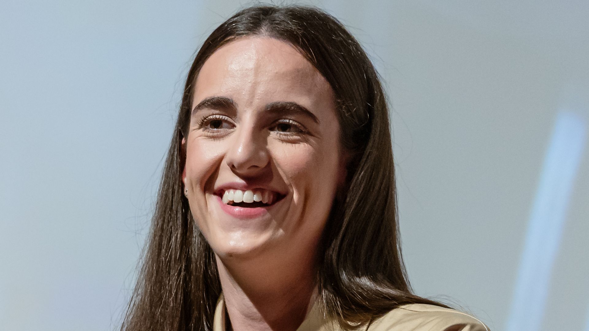 Caitlin Clark smiles at press conference