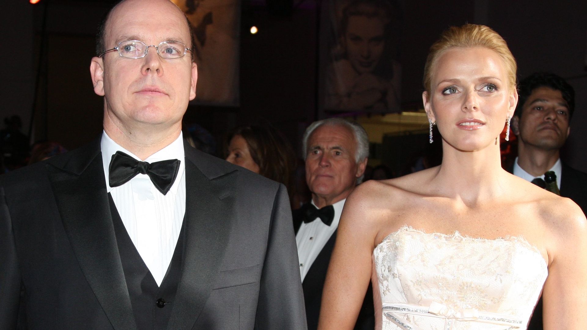 Princess Charlene in a strapless white dress with her husband Prince Albert