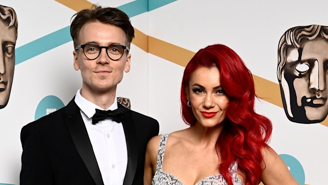 Joe Sugg in a tuxedo and Dianne Buswell in a sheer silver dress