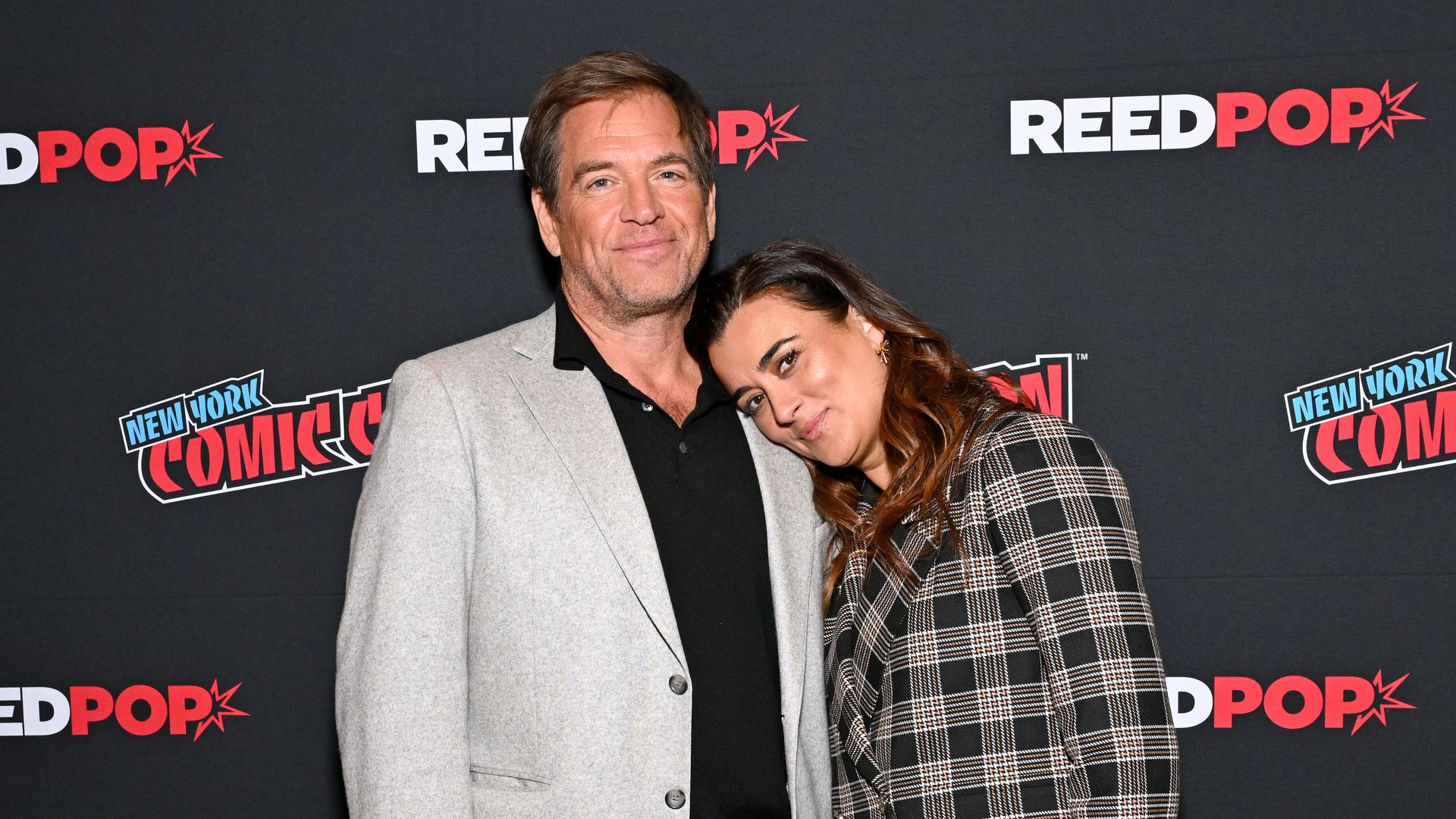 Michael Weatherly and Cote de Pablo attend the NCIS: Tony & Ziva Panel at New York Comic Con at Jacob Javits Center on October 09, 2025 in New York City.