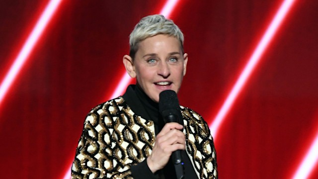 ellen degeneres on stage with mic