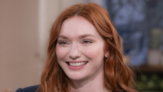 eleanor tomlinson in blue jacket 