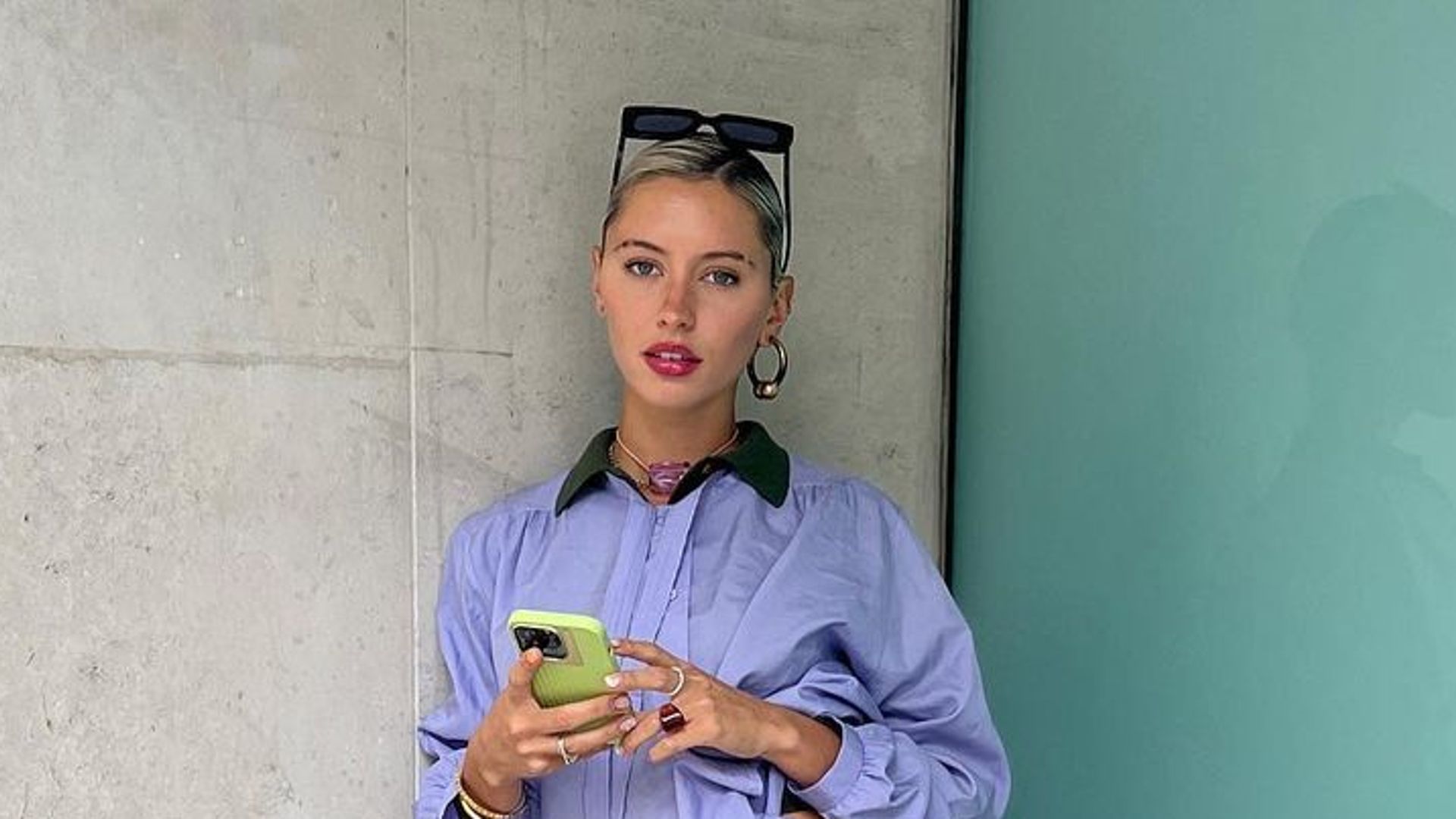 Iris Law shows off her blue shirt and tartan skirt on Instagram 