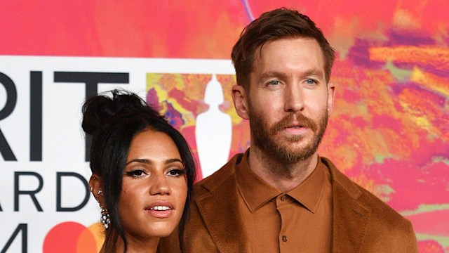 couple posing on red carpet