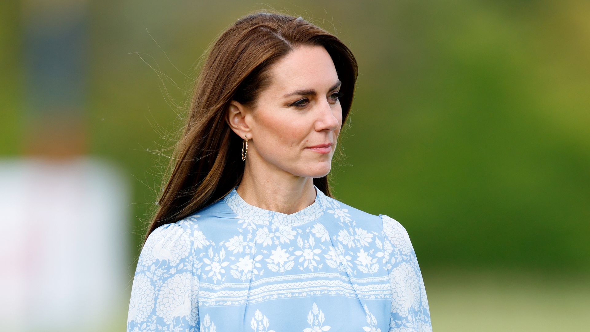 Princess Kate in white and blue dress at polo match in July 2023
