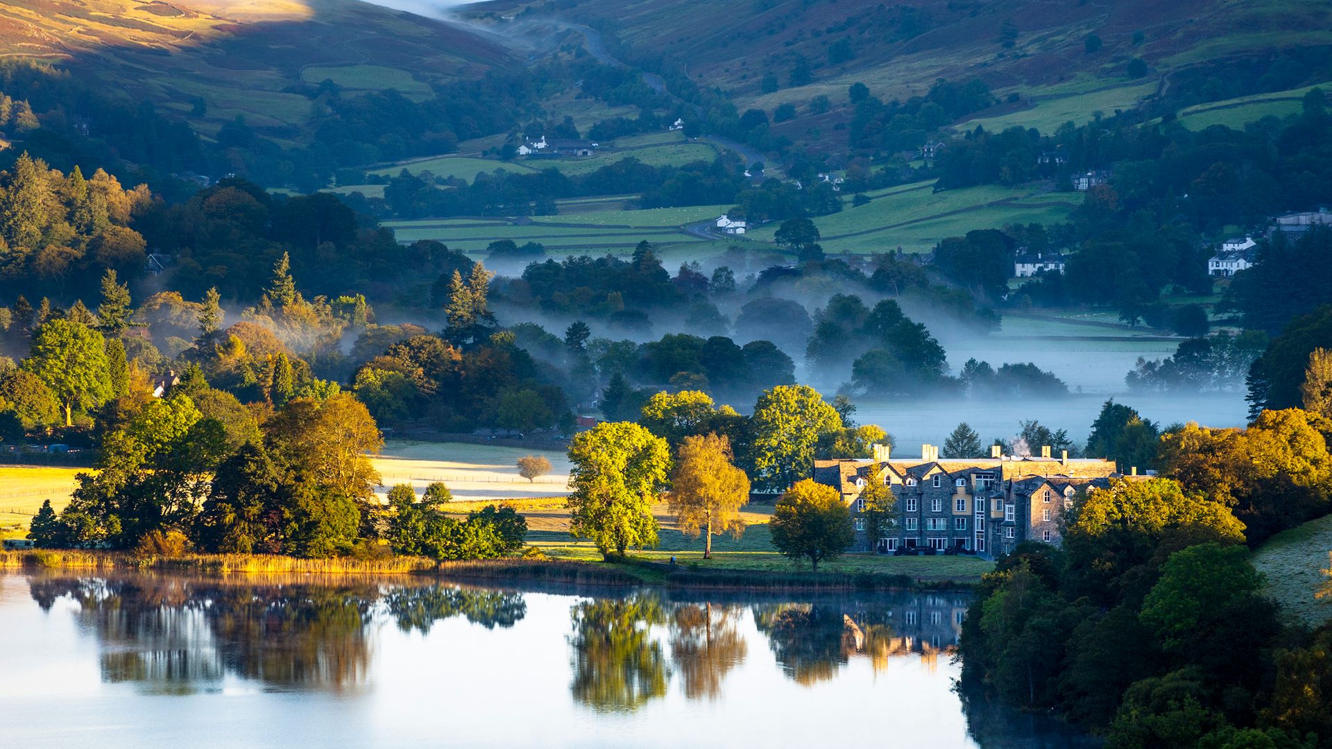 Misty October sunrise in Grasmere, in the English Lake District.