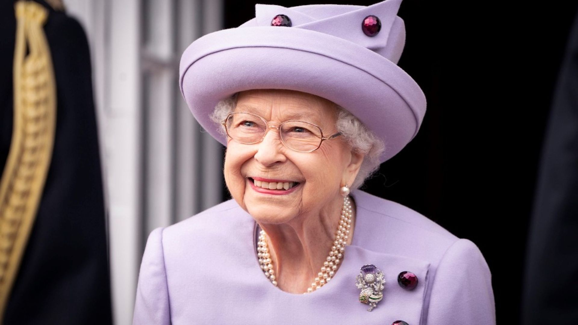 queen purple suit