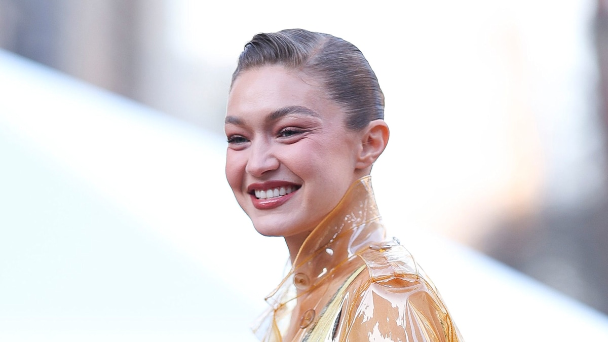 Gigi Hadid proves butter yellow is the hottest hue for SS25 in see-through trench and sequin dress