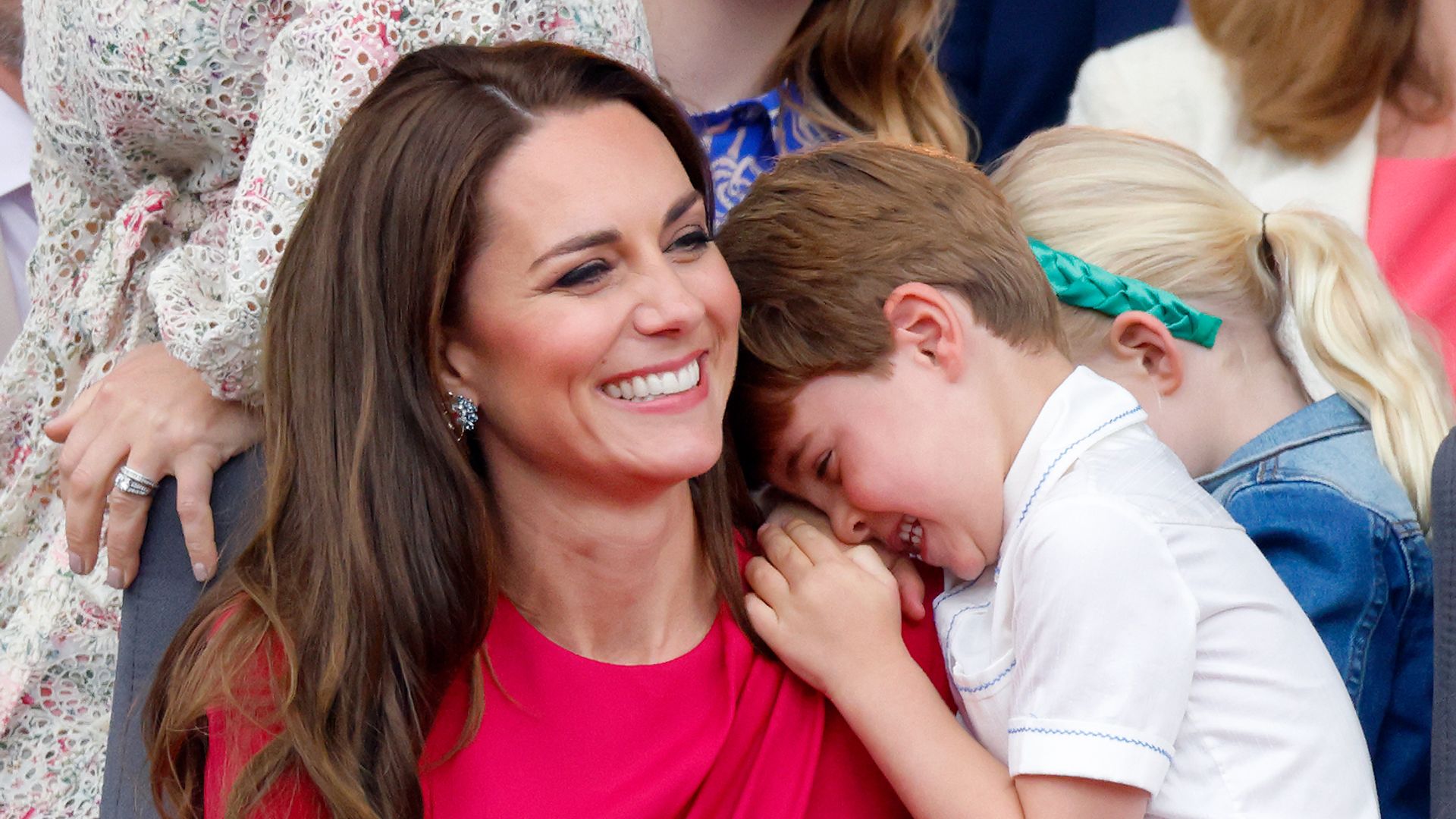 Prince Louis hugging Kate Middleton