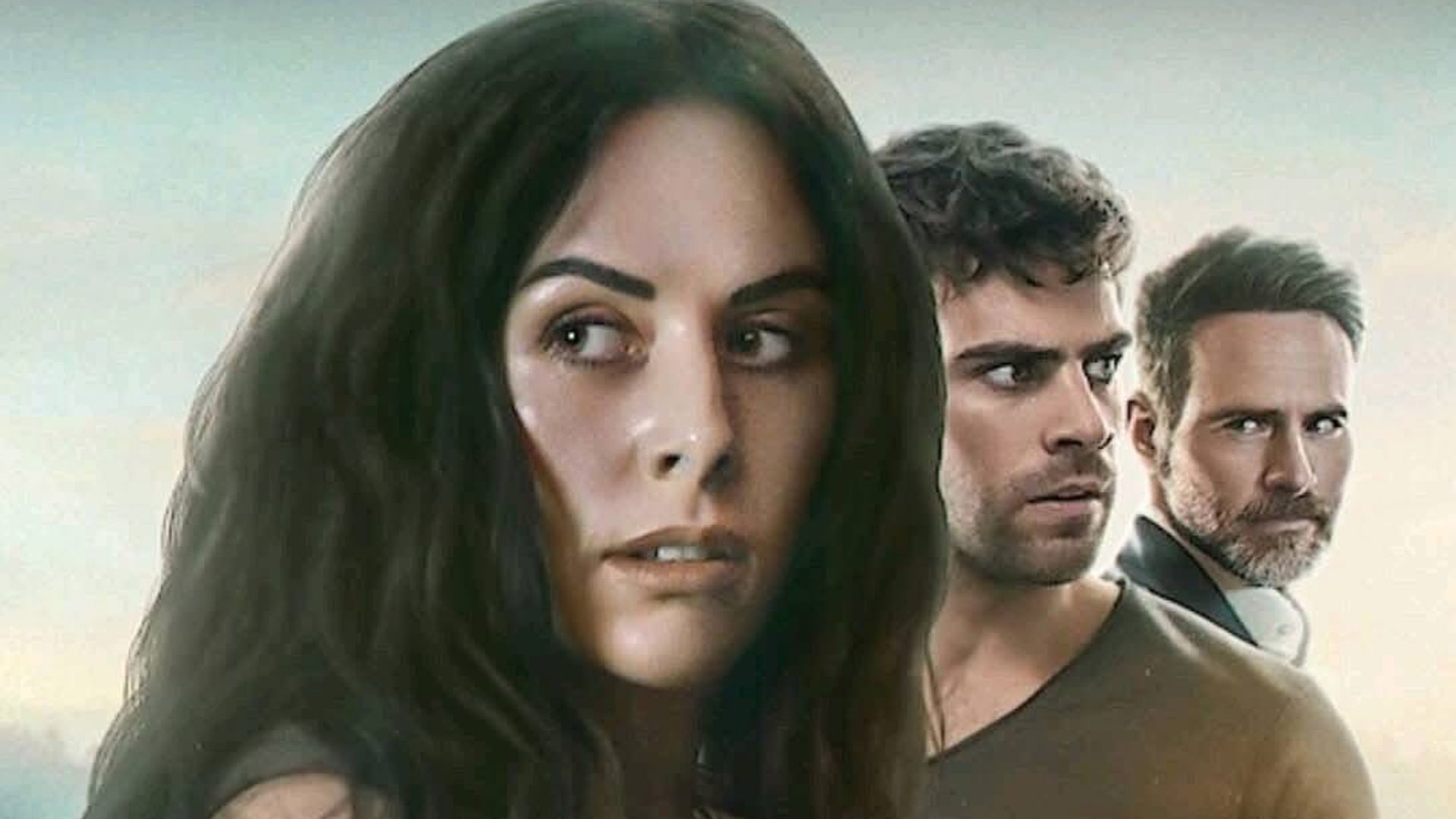 Three people look in different directions