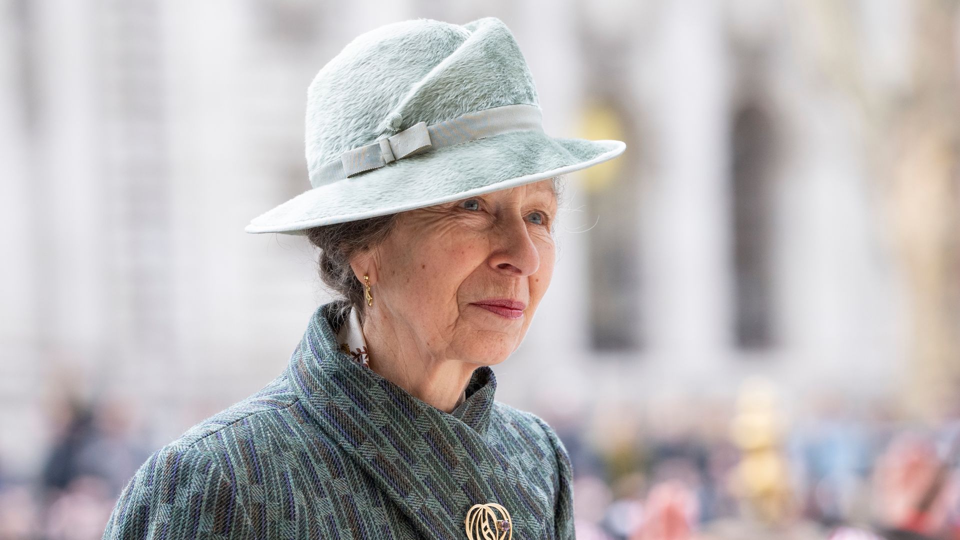 Princess Anne in green coat and hat