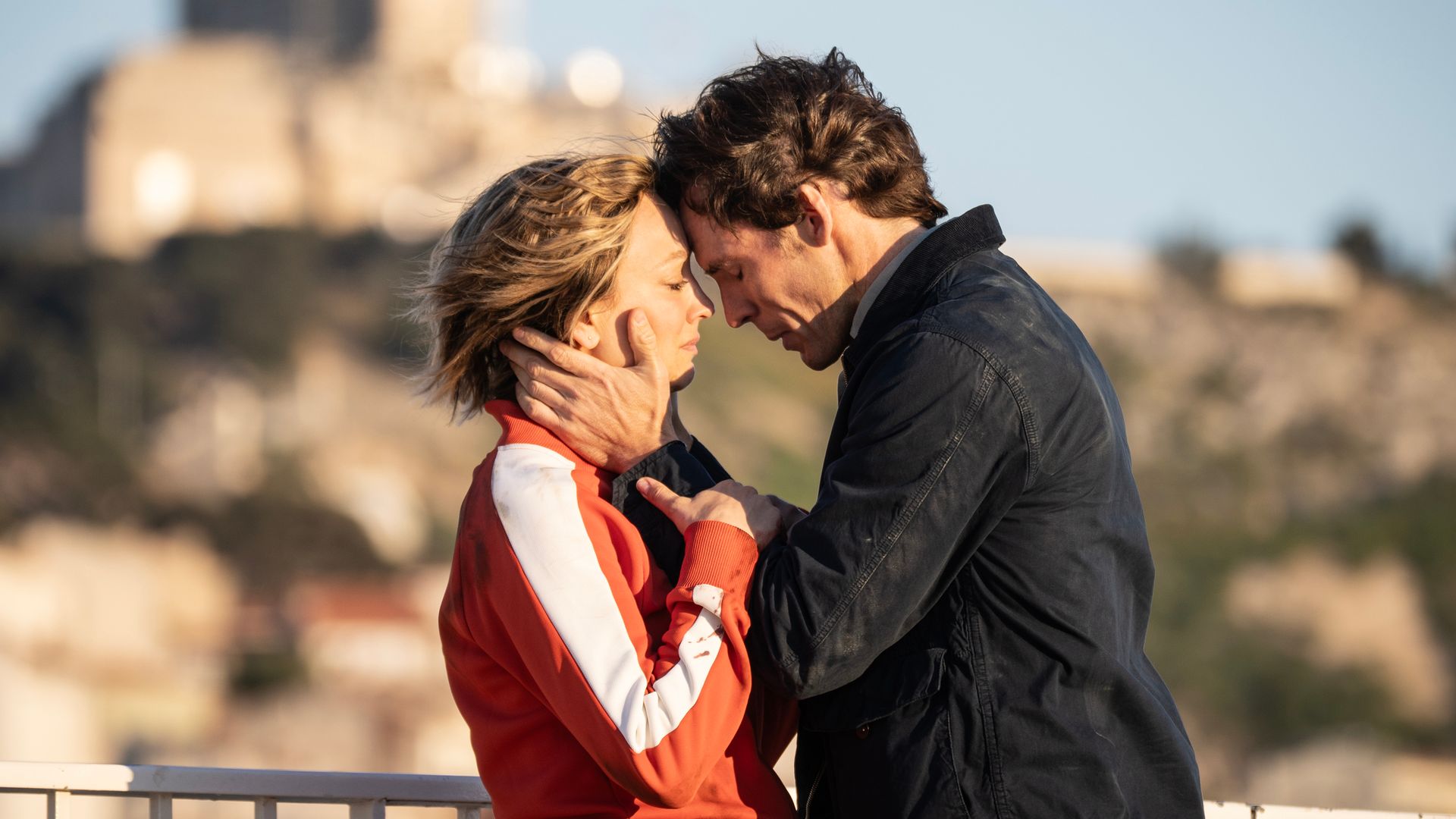 man and woman outdoors in sun