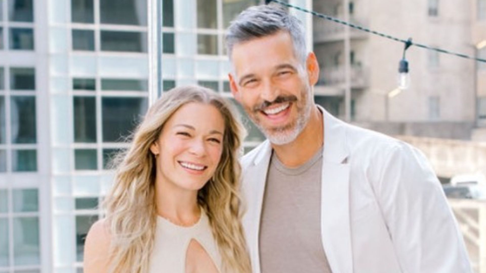LeAnn Rimes in a cut-out dress with husband Eddie Cibrian