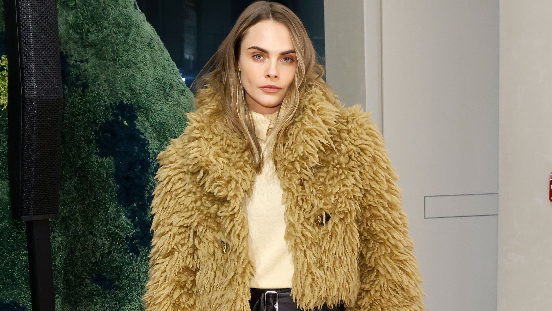 Cara Delevingne goes hell for leather at Burberry bash