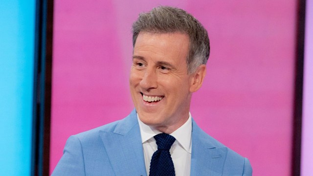 Anton Du Beke smiling in a blue suit