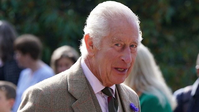 King Charles III meets estate staff and members of the public as he leaves after attending a church service in the village of Crathie, near Balmoral