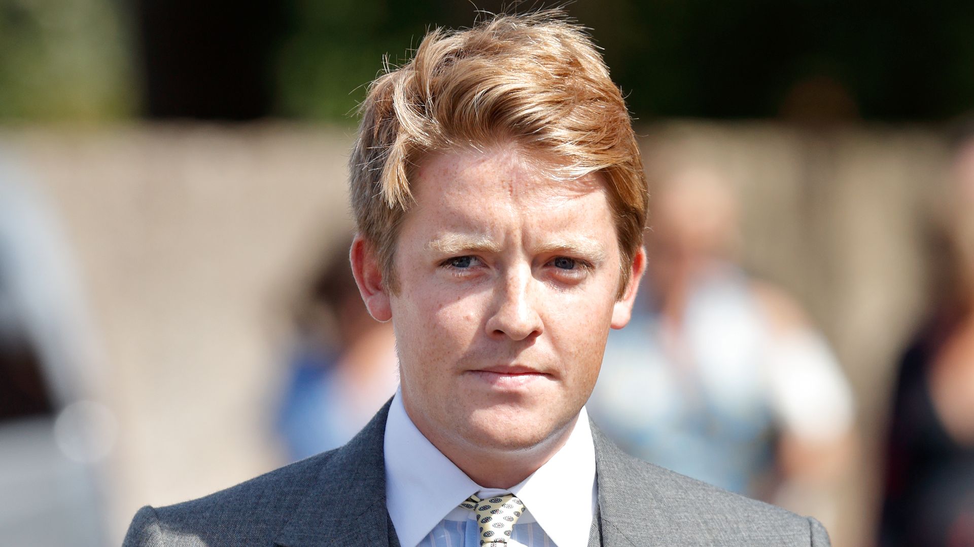 Hugh Grosvenor looking serious in suit