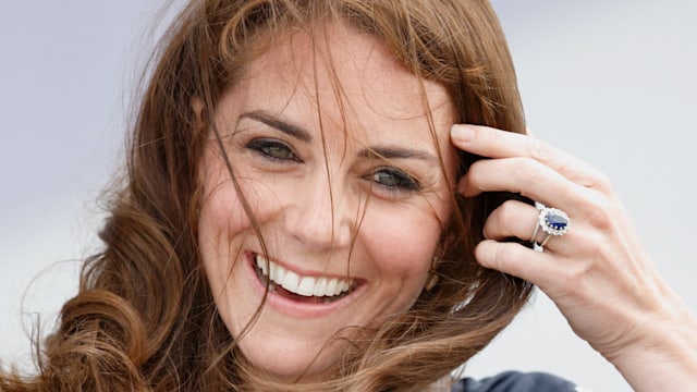 Kate Middleton's hair is blown in the wind as she visits Land Rover BAR during the America's Cup World Series on July 24, 2016 in Portsmouth, England. 