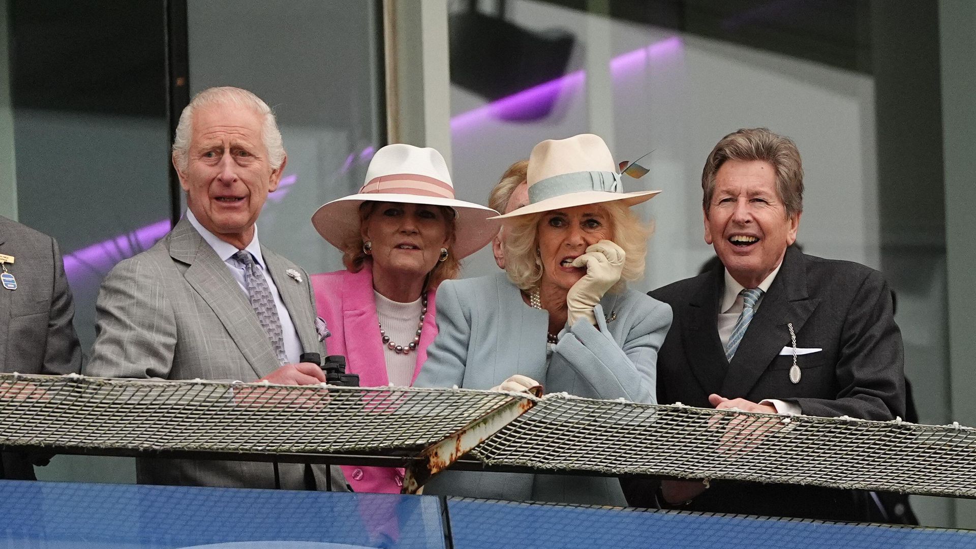 King Charles and Queen Camilla watching horse racing with Camilla biting her nails