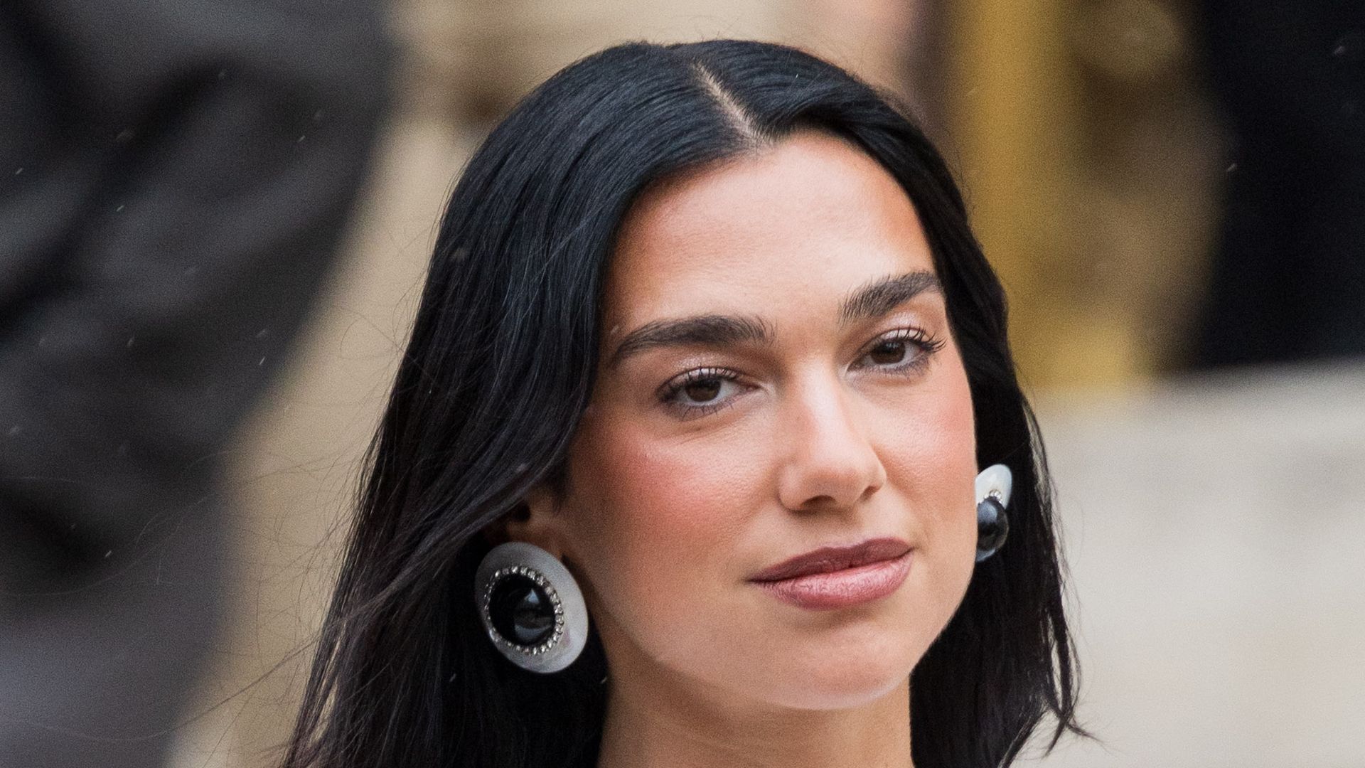 Dua Lipa in white dress with scales