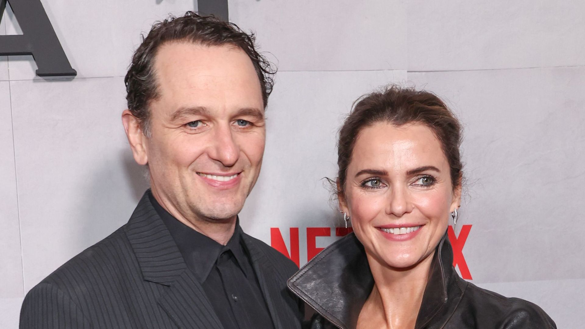 man and woman smiling for photo