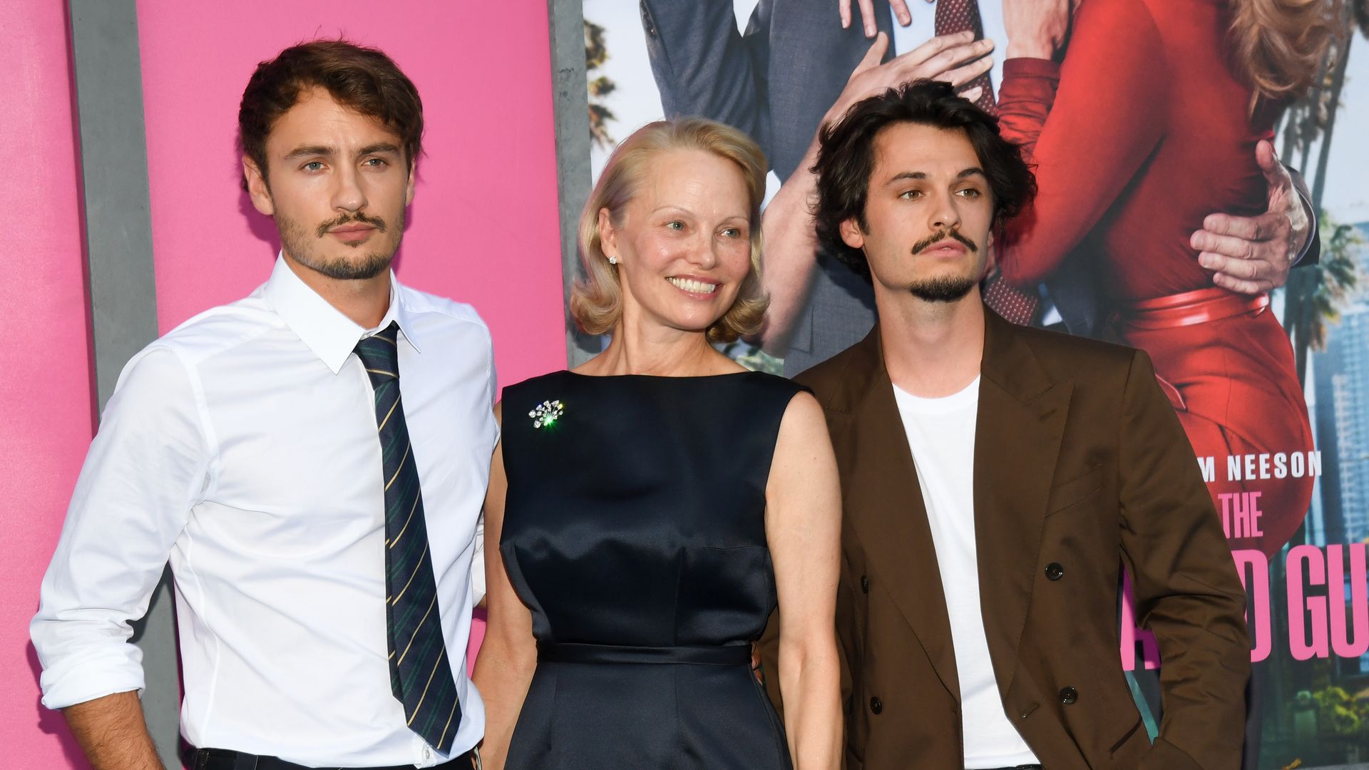 Brandon Thomas Lee, Pamela Anderson, Dylan Jagger Lee at "The Naked Gun" New York Premiere on July 28, 2025 in New York