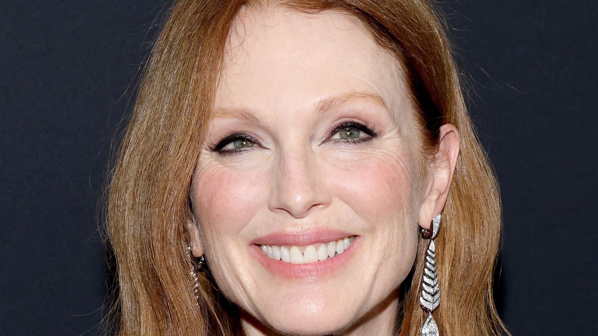 Julianne Moore attends the Kering Foundation's Caring for Women dinner 