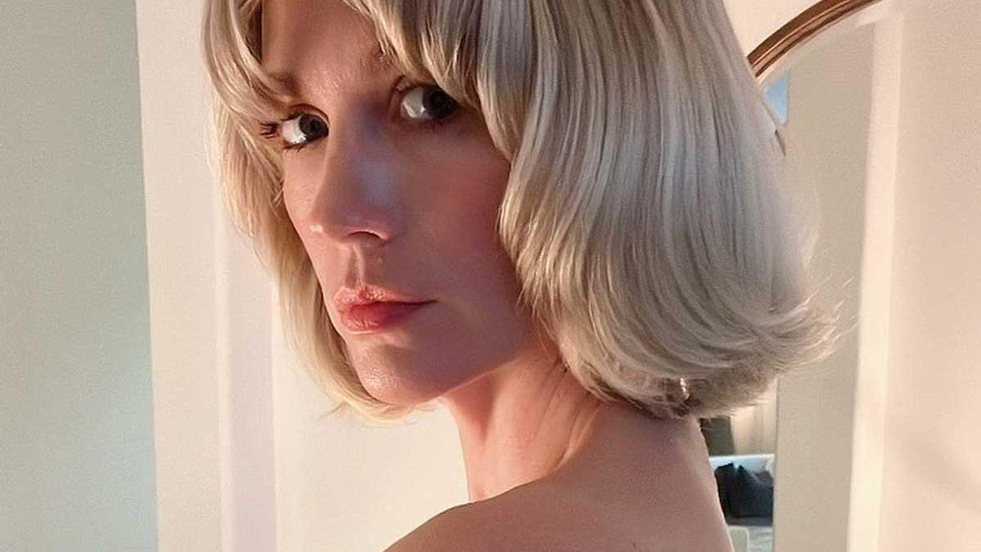 January Jones pours curves into plunging bodysuit inside designerclad