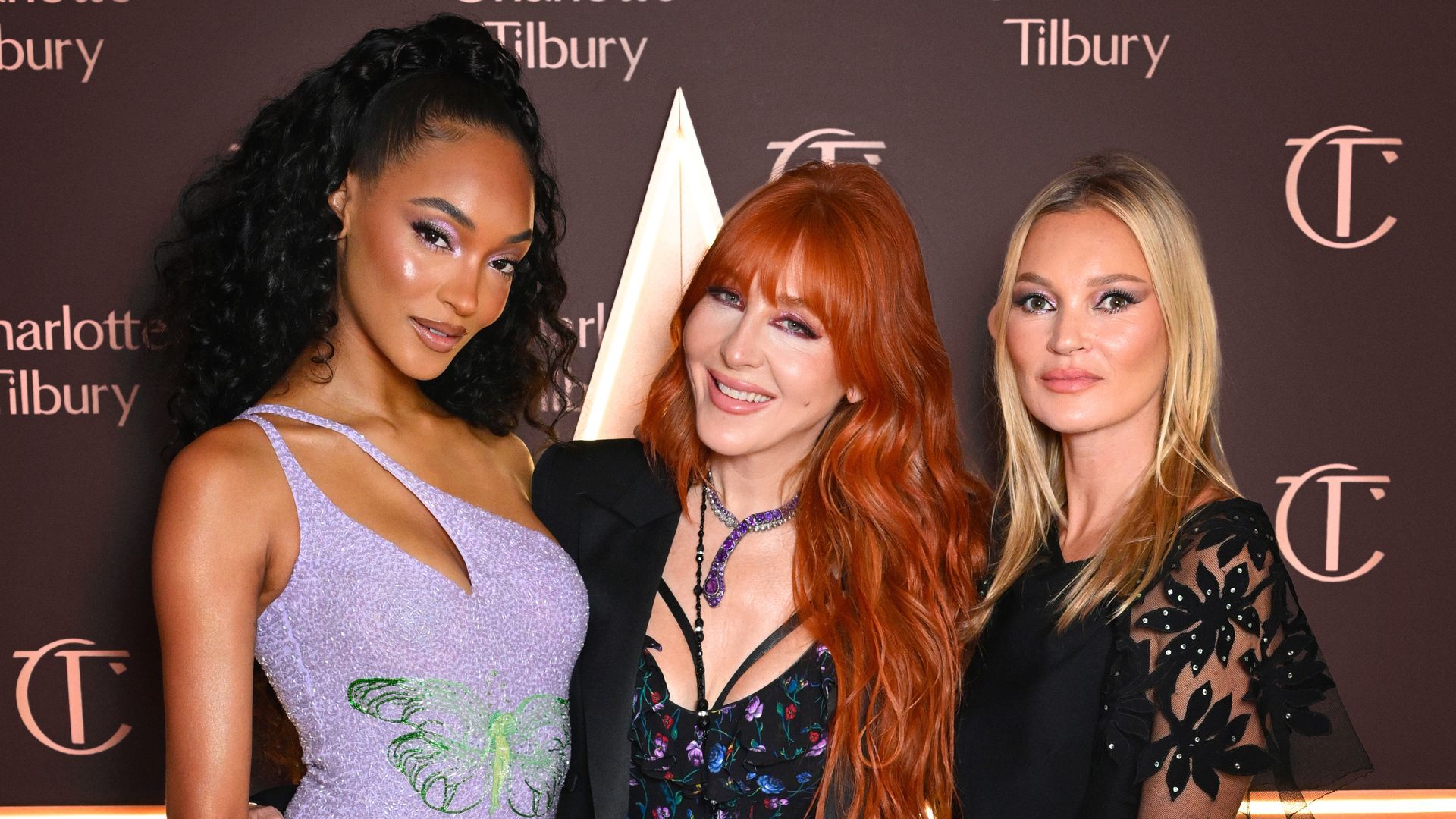 PARIS, FRANCE - OCTOBER 04: Jourdan Dunn, Charlotte Tilbury and Kate Moss attend the Global unveiling of Charlotte Tilbury's Holiday Campaign at Club Magic on October 04, 2023 in Paris, France. (Photo by Kristy Sparow/Getty Images for Charlotte Tilbury)