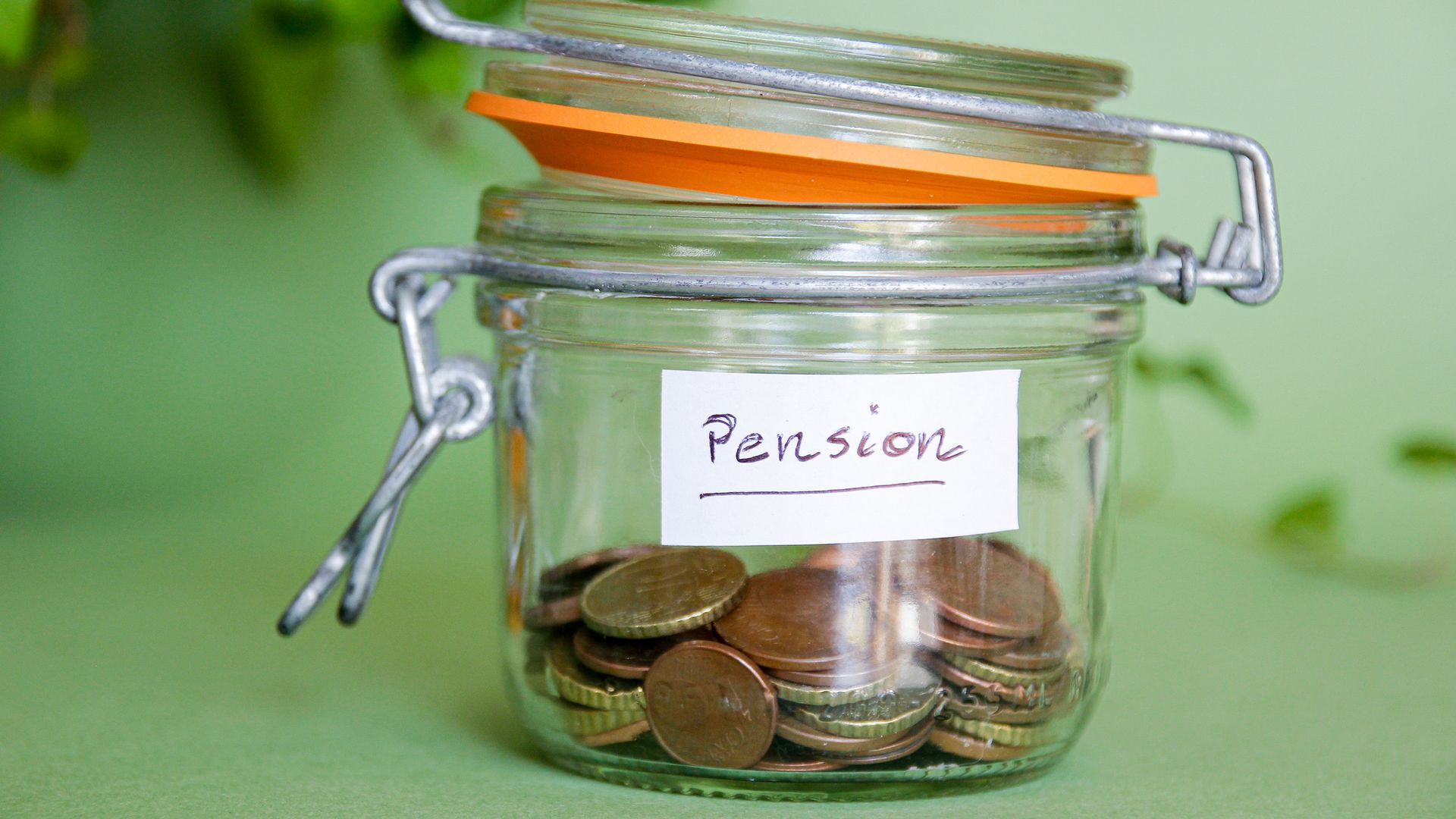 Jar with money saved for pension