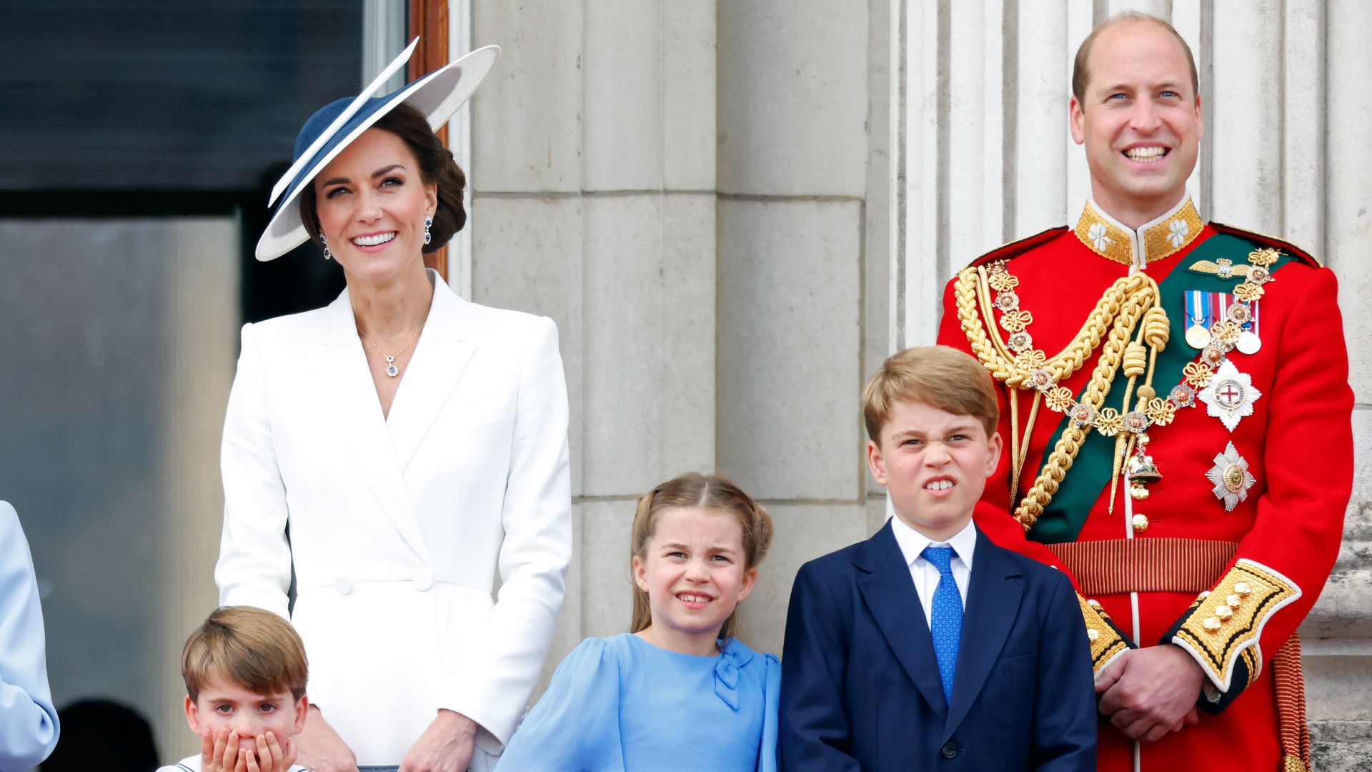 Prince William and Kate Middleton with Prince George, Princess Charlotte and Prince Louis watching flypast