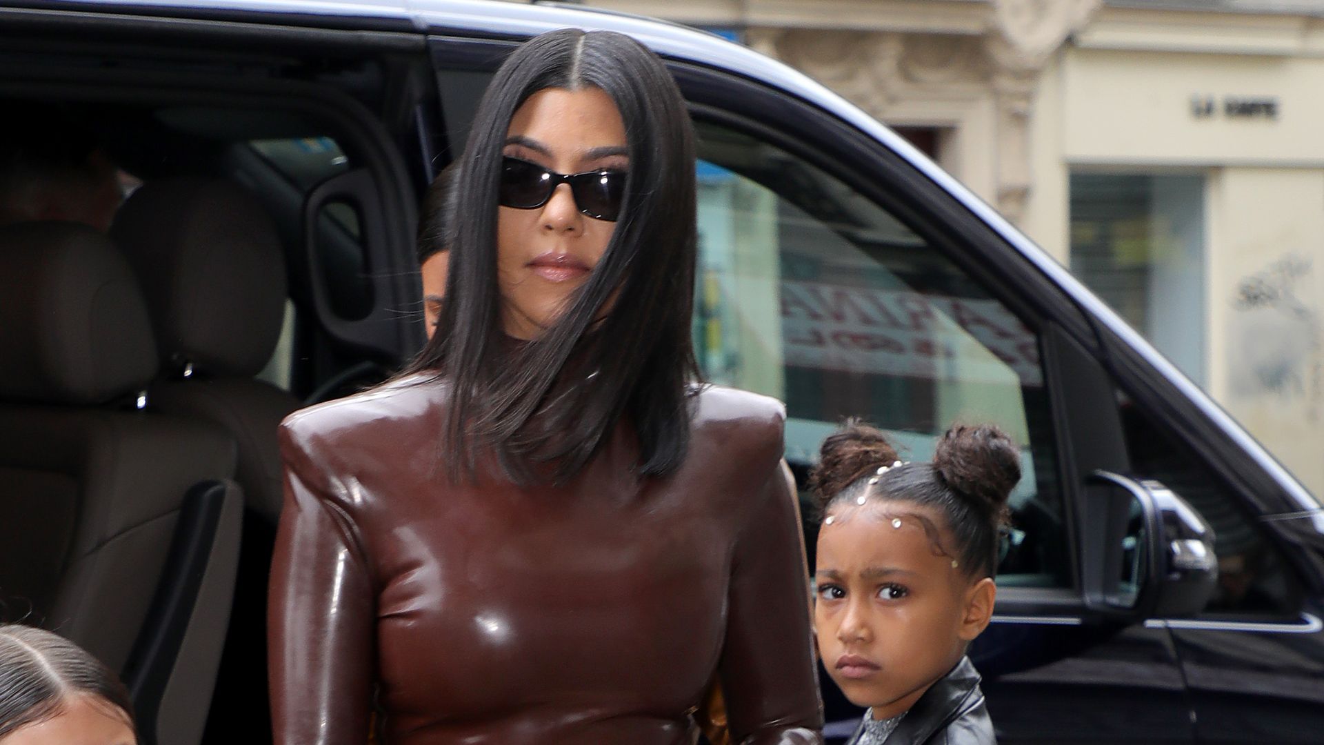 Kourtney Kardashian her daughter Penelope Disick,  and her niece North West